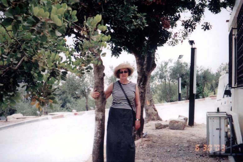 Eva next to the tree planted in Wiktoria and Stanislaw Szumielewicz’ honor