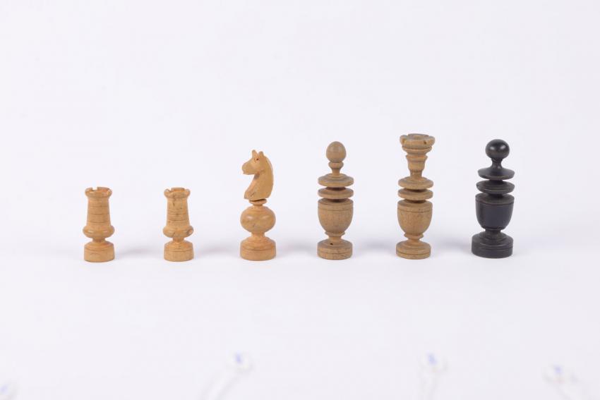 Chess pieces that the Freiburg family took from home when they went into hiding.